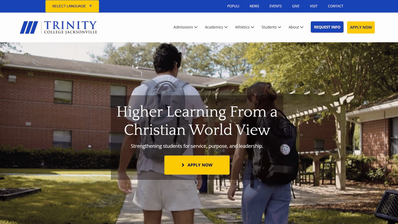The homepage hero section for the Trinity College Jacksonville website has a background video. It’s a compilation of students doing things like walking the campus, working together, and participating in and attending a concert. The text over the top reads “Higher Learning from a Christian World View: Strengthening students for service, purpose, and leadership”. Below this is a yellow “Apply Now” button.