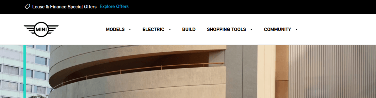 MINI website navigation - NORMAL A screenshot showing what the NORMAL navigation link state looks like on the MINI USA website. The Normal links are black with no additional styling.