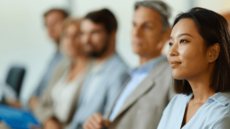 people sitting at an association conference