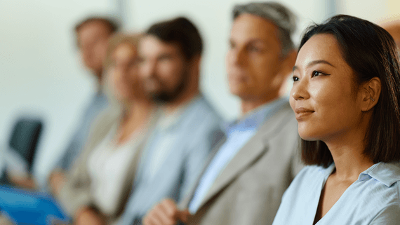 people sitting at an association conference