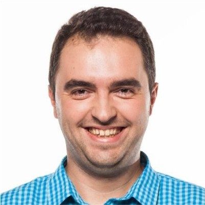 headshot of white guy with black hair